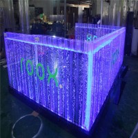 Custom made water bubble wall design used as acrylic LED bar counter table